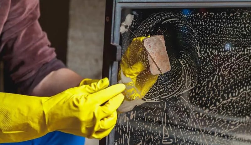 cleaning fireplace glass doors